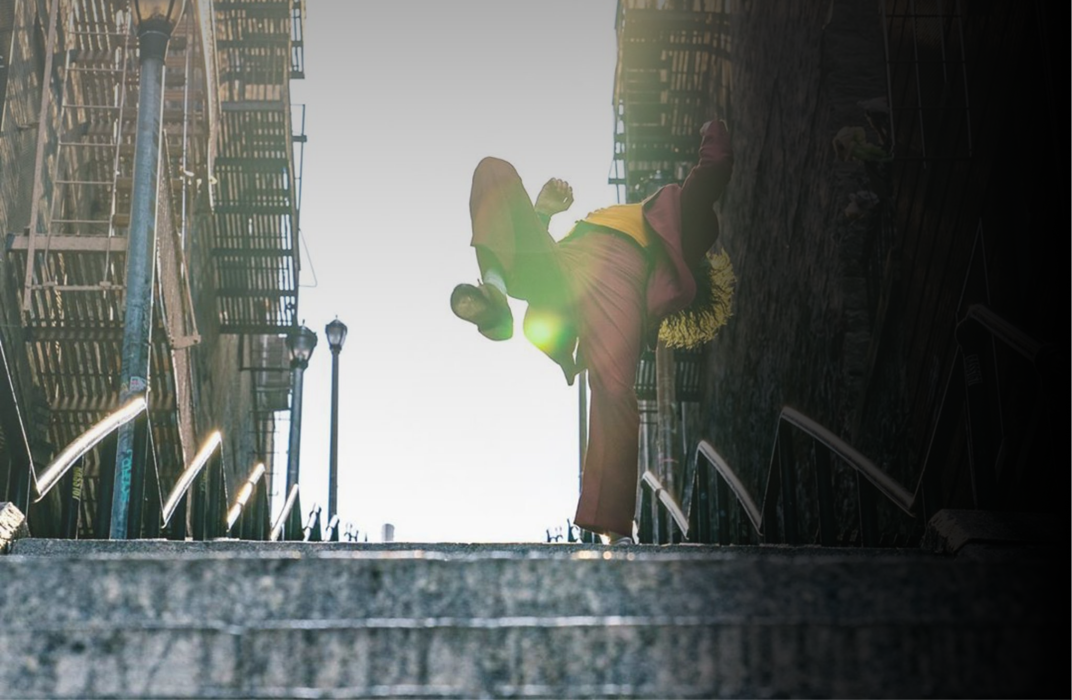 An image Joker dancing down some stairs